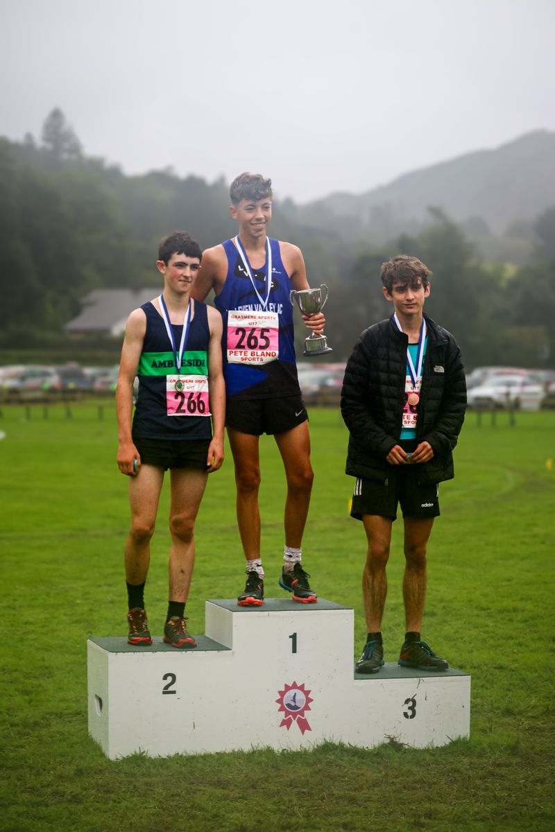 Zeke Sumner (left) on the podium for the Under-17s race at Grasmere Lakeland Sports and Show 2024