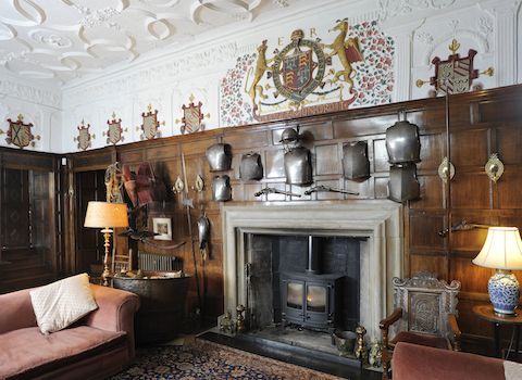 Fireplace at Elizabethan Levens Hall and Gardens, located close to Kendal in the Lake District, Cumbria.