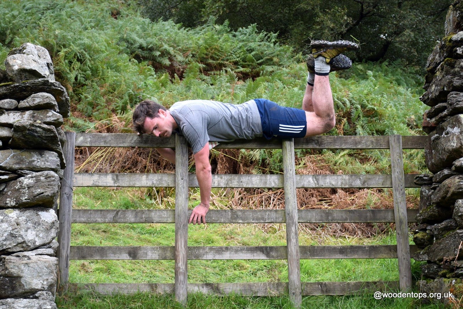 A fell runner tackling 'The Fence' at the Grasmere Lakeland Sports and Show 2023