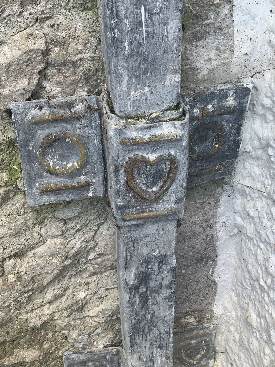 The Ace of Hearts on a downspout at Levens Hall and Gardens, Cumbria