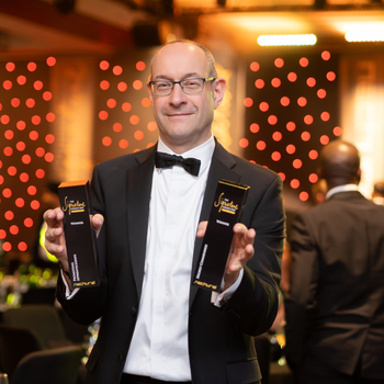 FBC Manby Bowdler chief executive Neil Lloyd celebrates double success at the Signature Awards in Birmingham.jpg