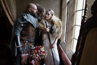 Couple at the drawing room window at Langley Castle Hotel