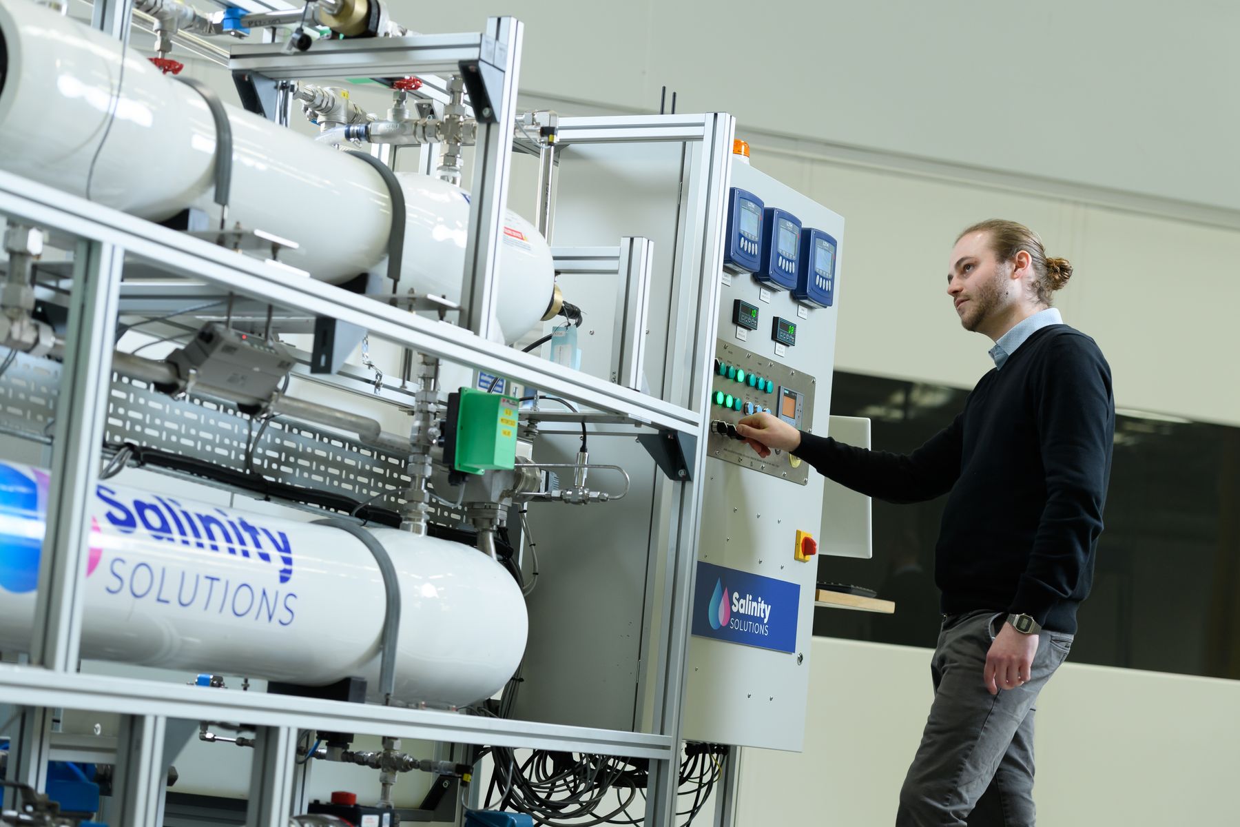 Tim Naughton, co-founder and Chief Technical Officer, Salinity Solutions, demonstrating the company's water treatment technology. 