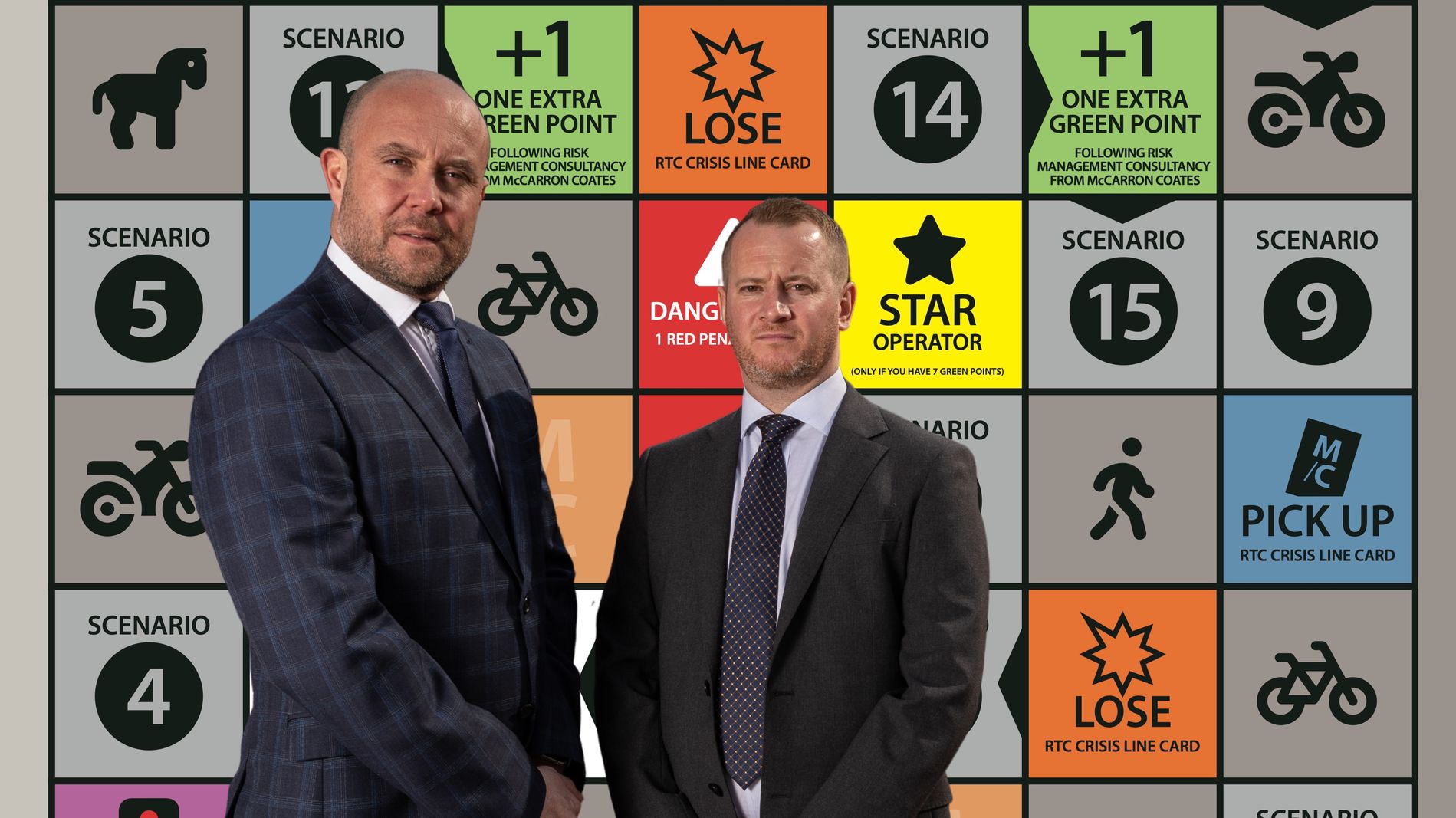 Paul Coates and Ian McCarron in front of the broker's new Road Hierarchy board game