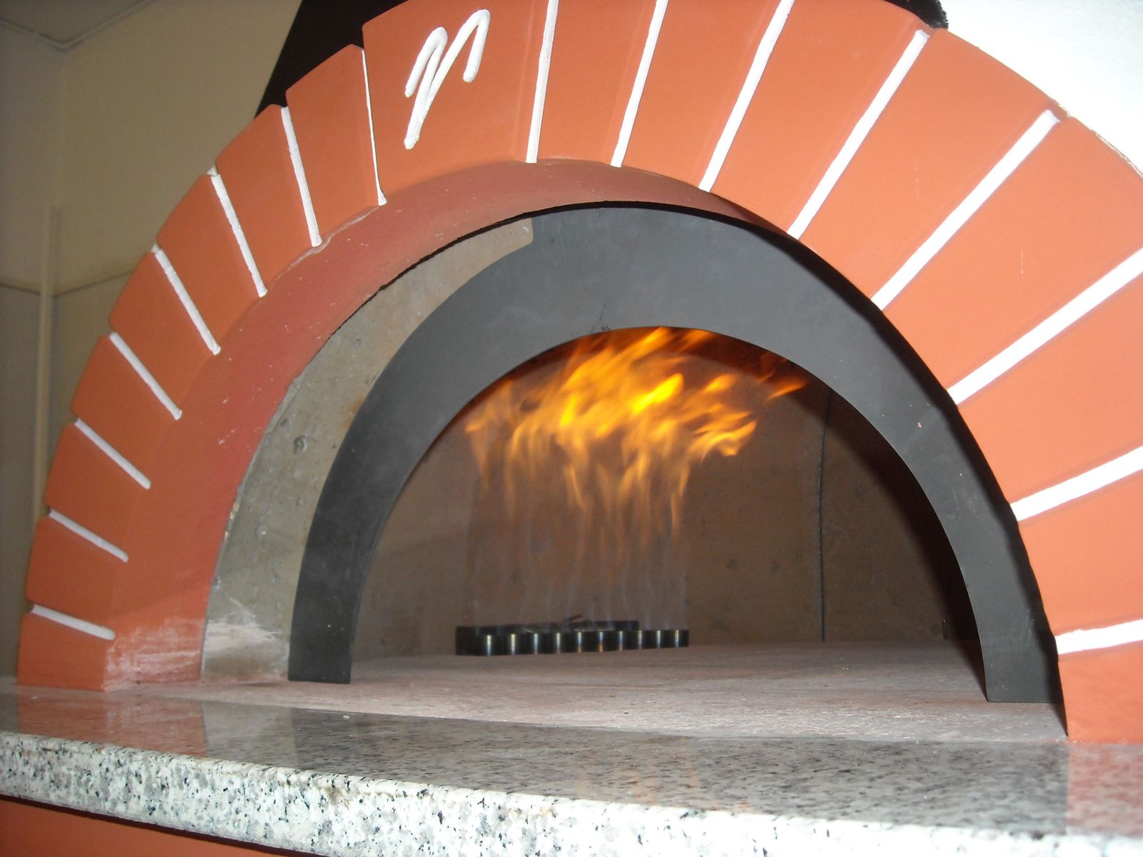 A commercial gas-fired pizza oven from Valoriani UK