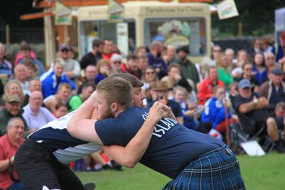 One of the Icelandic wrestlers gets into backhold with another wrestler at the 2023 Grasmere Lakeland Sports and Show