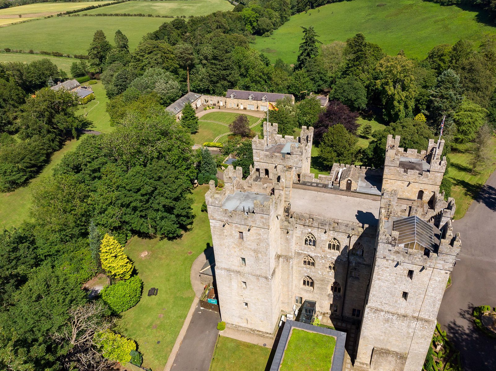 Langley Castle Hotel and its Castle View accommodation behind