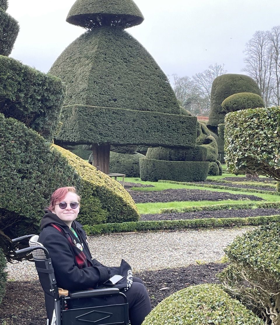 Hex Gregson starting her degree project in the Levens Hall and Gardens topiary garden 