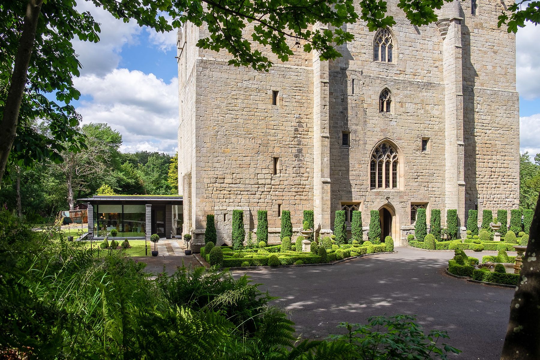 View from the trees surrounding the car park at Langley Castle Hotel, Northumberland,