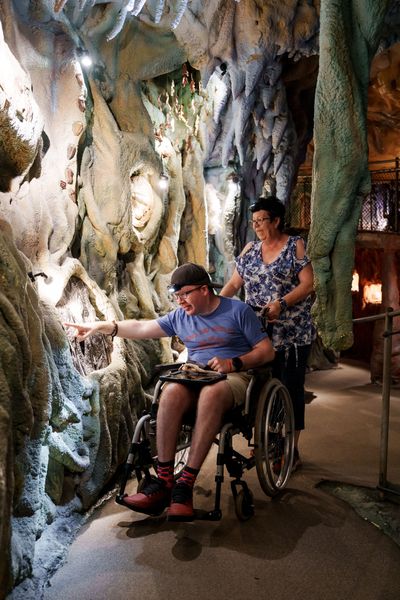 The Crystal Caves_wheelchair visitor Ben Daley with carer_2.jpg