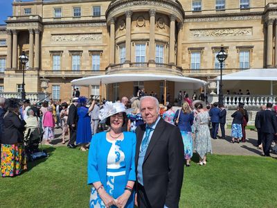 Beverley Sunderland and her husband at Buckingham Palace
