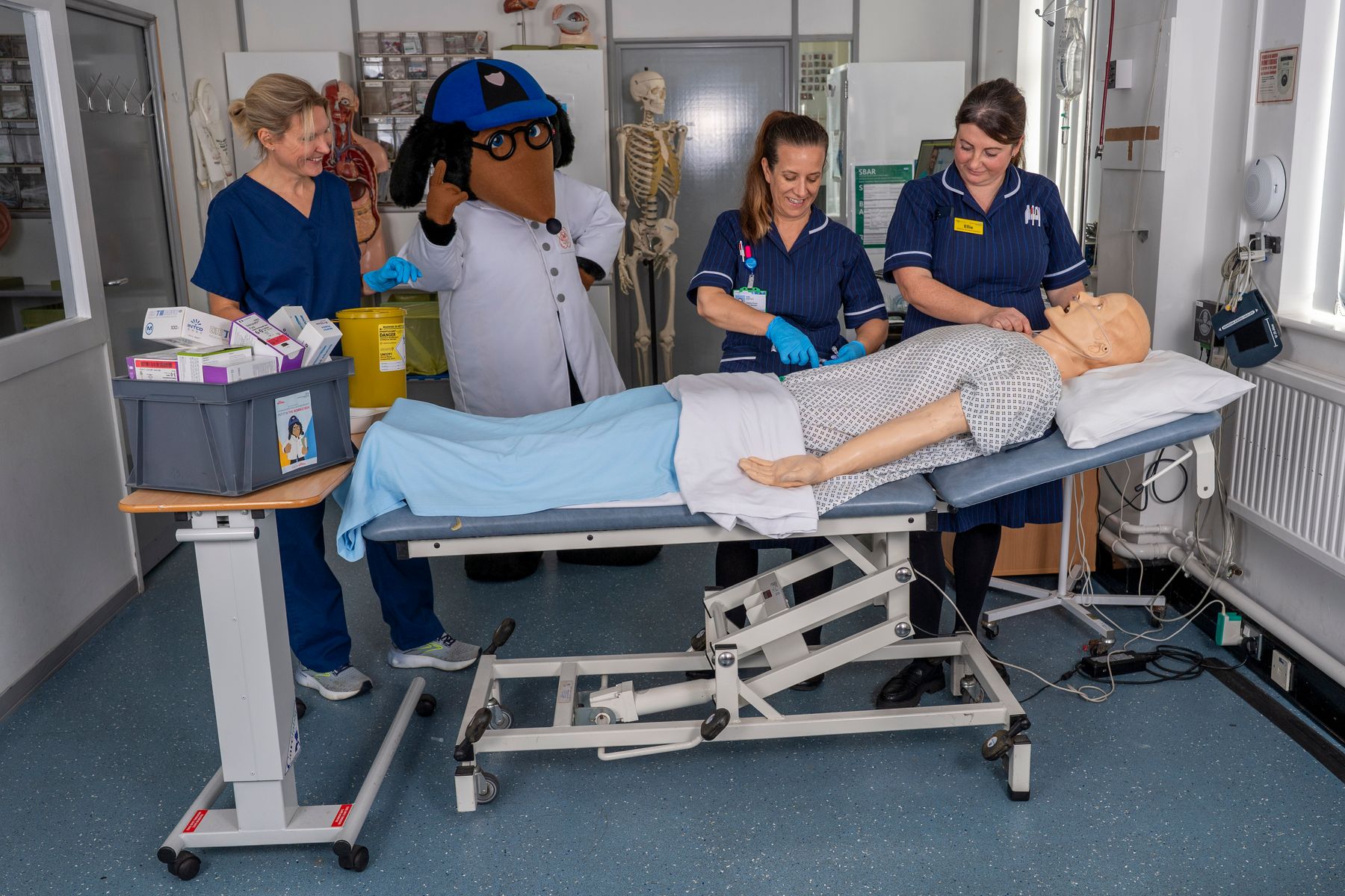 PA image - Palliative Care Team (L-R) Dr Zoe Palmer, Kelly Southern and Ellie Gibson with Wellington Womble.JPG