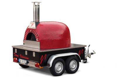 A Valoriani UK Forno Trailer Vesuvio GR UK mobile pizza oven, mounted on a trailer