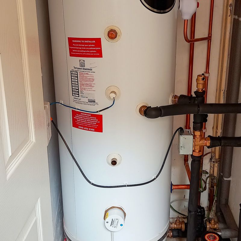 Heat Saviour in place, situated underneath a standard hot water cylinder