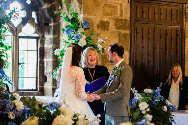 Bride and groom enjoying a July 2021 castle wedding at Langley Castle Hotel, Northumberland.
