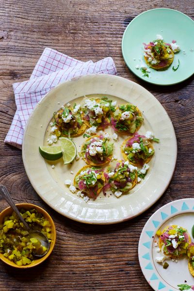 Vadasz Tostaditas with guacamole, red onions, sauerkraut & Jalapeño relish