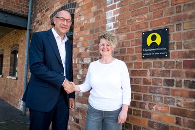 Chief executive of Adeptio Law Group and FBC Manby Bowdler, Neil Lloyd, with Helen Moore, managing director of The Specialist Law Group.jpg