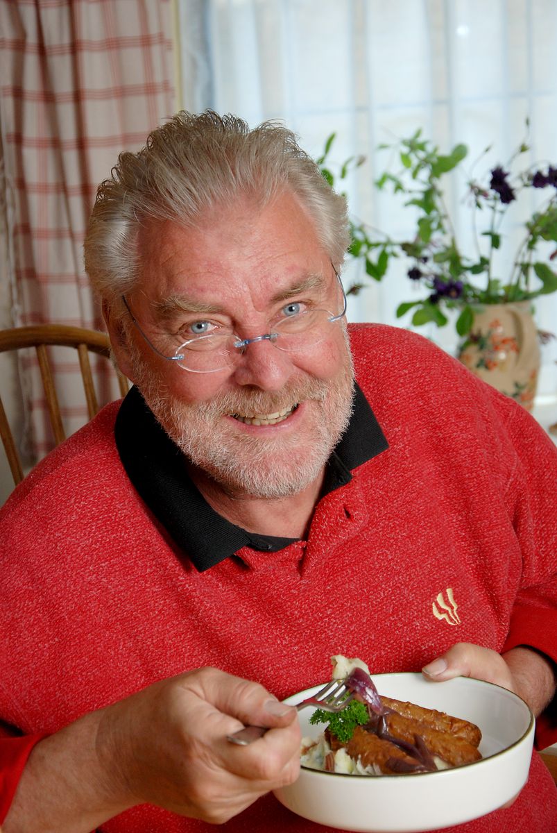 Close up of man eating a vegetarian dinner