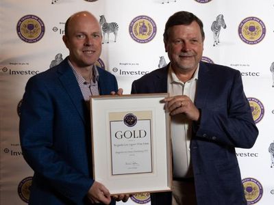 Winemaker Johann Fourie and Hugo van der Ahee, Investec Head of Winelands Region.jpg