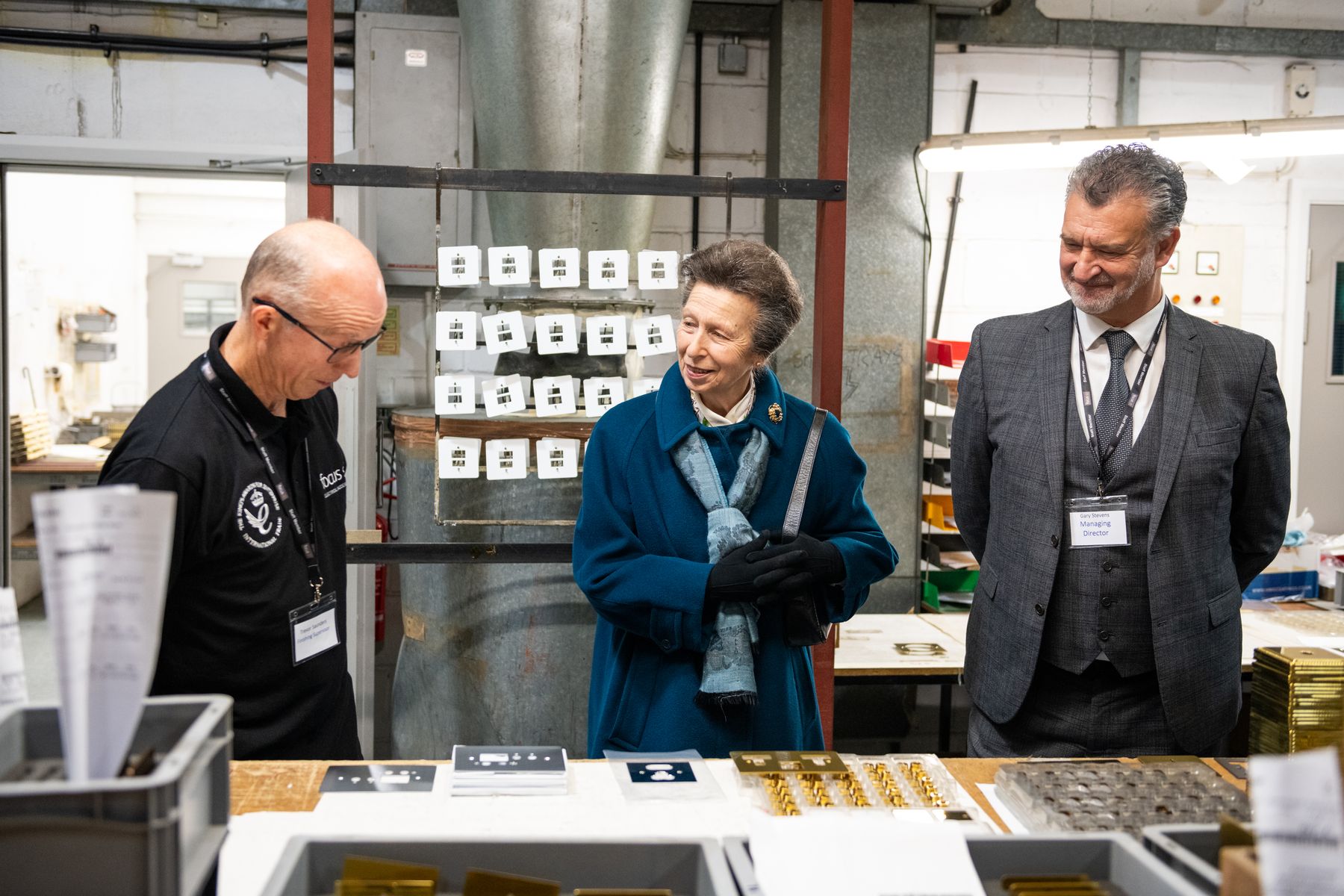 Finishing supervisor Mr Trevor Saunders explains processes to HRH The Princess Royal