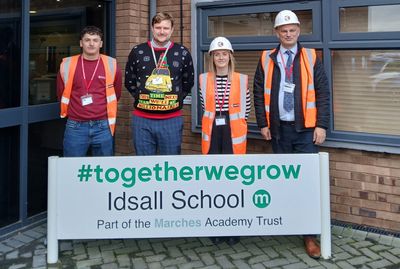 Pic caption (L-R) - McPhillips apprentice Ollie Fudge, Idsall School Head of Construction Graham Northall, McPhillips social value co-ordinator Emily Myatt and McPhillips procurement manager Roger Cox.jpg