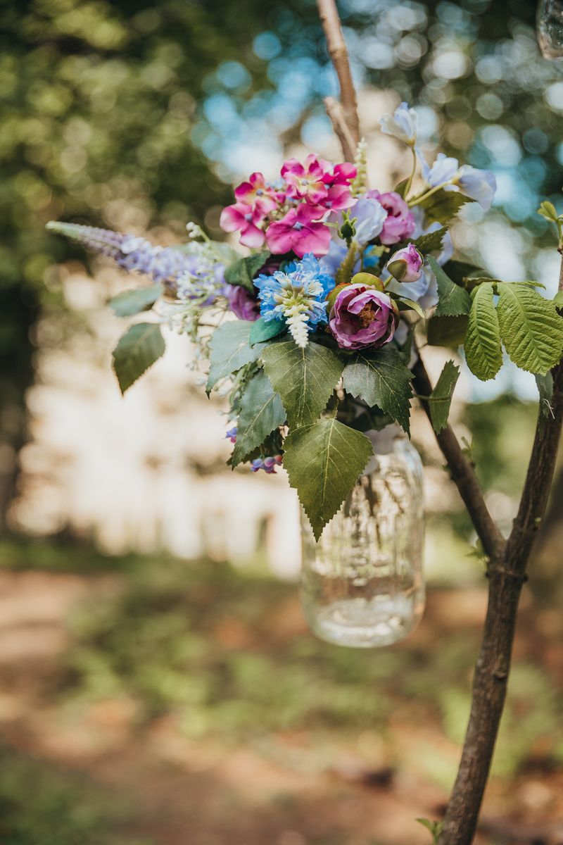 Floral feature at a woodland wedding at Langley Castle Hotel, Northumberland