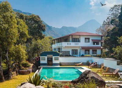 Reclaim Yourself Retreats in India tea estate and pool.jpg