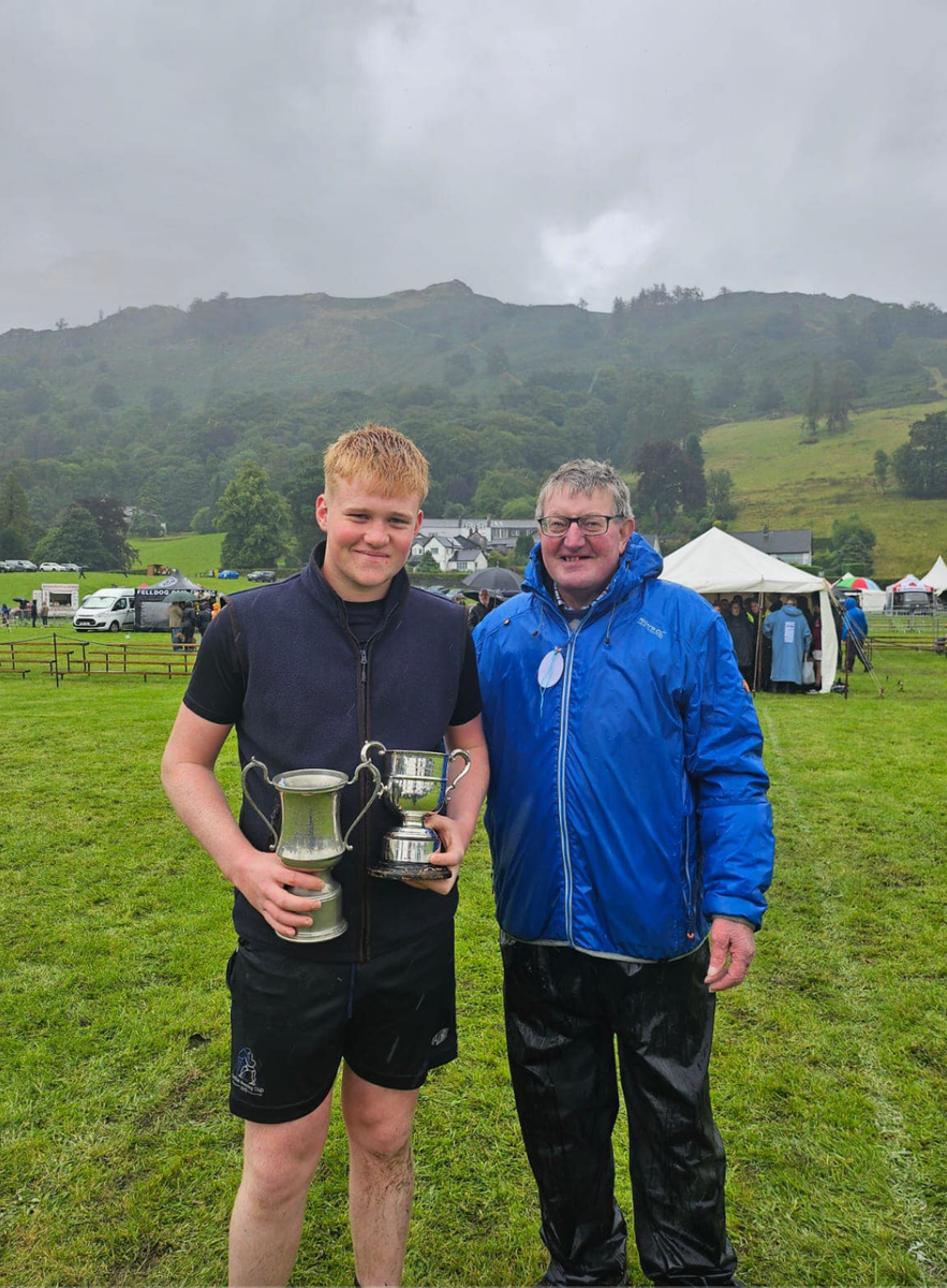 George Peacock, winning Cumberland and Westmorland wrestling trophies at Grasmere Lakeland Sports and Show