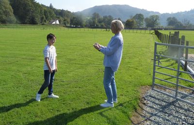 Grasmere Lakeland Sports and Show 'Young Sports Reporter 2024', Harry Taylor, receiving his trophy.