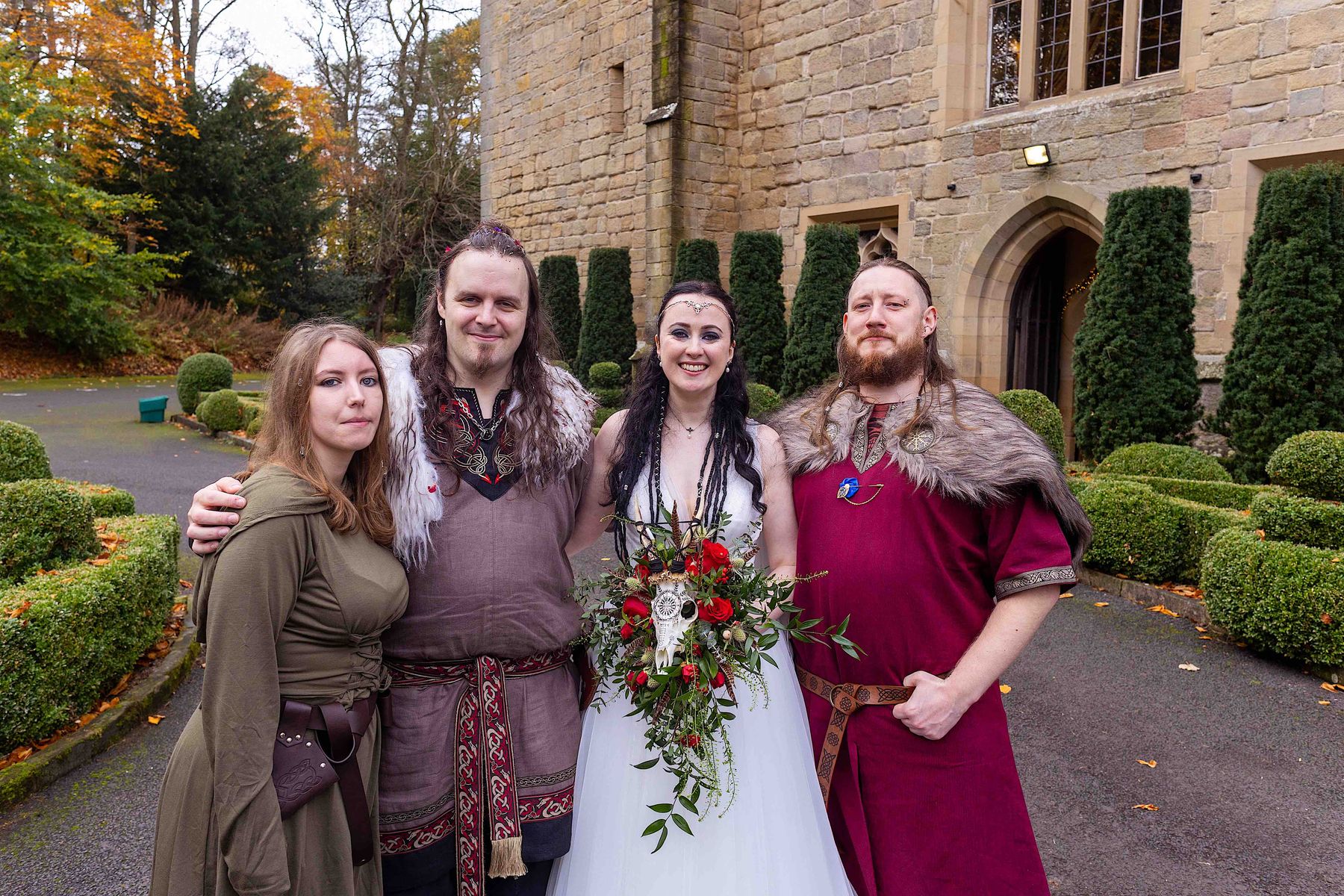 Bride, groom and guests at the Viking wedding that was staged in various parts of  Langley Castle, Northumberland, including the woodland wedding grove and the tipi