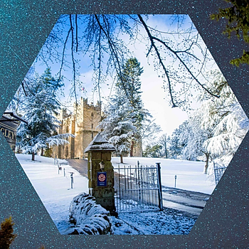 Langley Castle in winter in dark sky, starry night setting