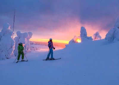 Reclaim Yourself Retreats in Finland sunset snowboard.jpg