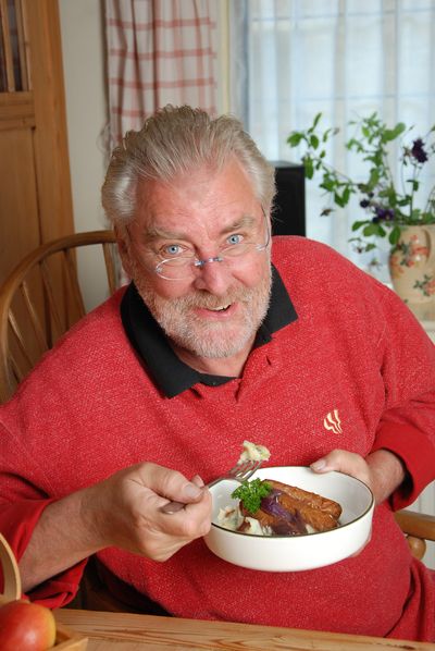 Man eating a vegetarian dinner