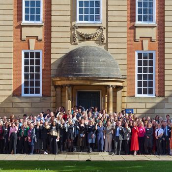 Attendees celebrate International Women's Day outside Lady Margaret Hall