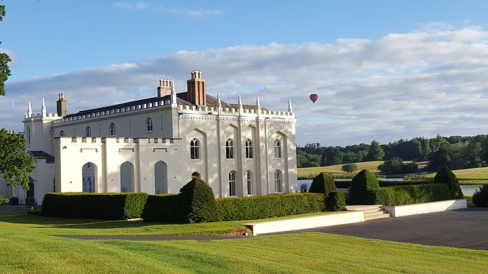 Shot Of Abbey And Hot Air Balloon