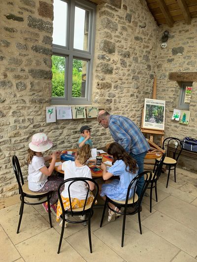 Artist Bob Sutcliffe delivering a children's art workshop at Levens Hall and Gardens.