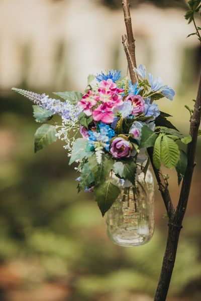 Floral feature at a woodland wedding at Langley Castle Hotel, Northumberland