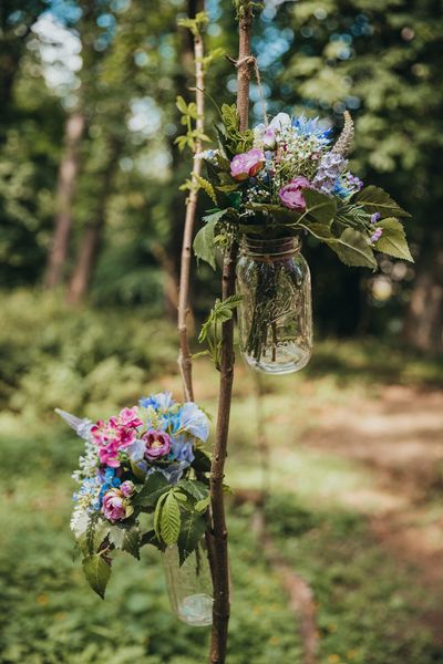 Floral feature at a woodland wedding at Langley Castle Hotel, Northumberland