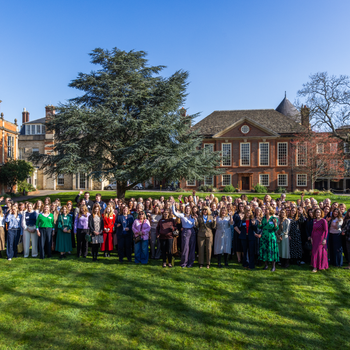 Attendees gather outside Somerville College, University of Oxford for Gardner Leader's International Women's Day event