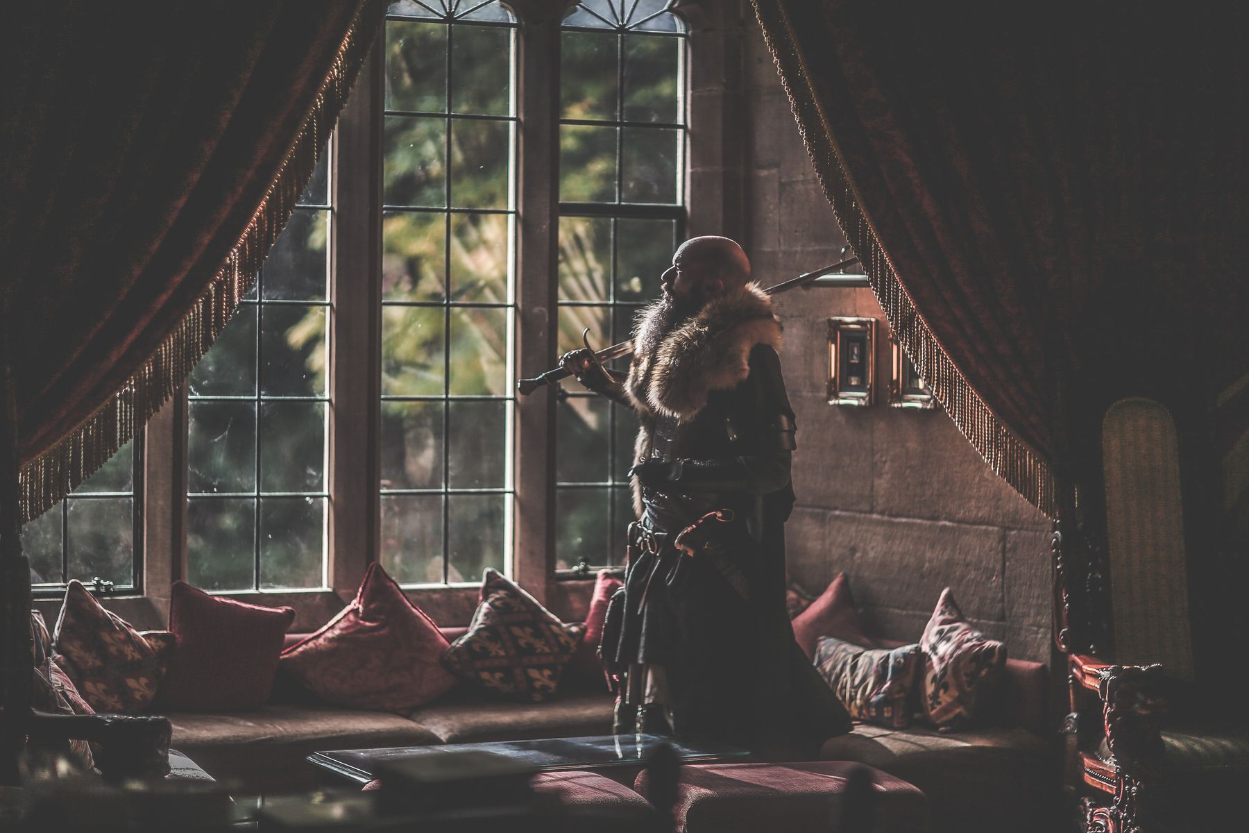Man in the drawing room of Langley Castle Hotel