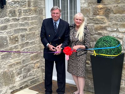 Dr Stuart and Dr Mariann Madnick, Baron and Baroness of Langley, perform the ribbon cutting at Toll Bar Luxury Villa, at Langley Castle, Northumberland, UK