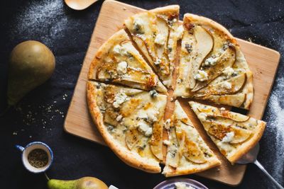 A pear and gorgonzola pizza - a delicious combination of toppings for a cheese lover.