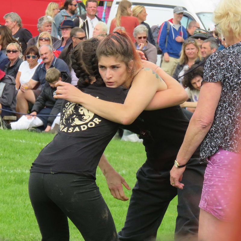 Breton wrestler, Anäelle Le Piolet, in Cumberland and Westmorland wrestling action at Grasmere Lakeland Sports and Show.