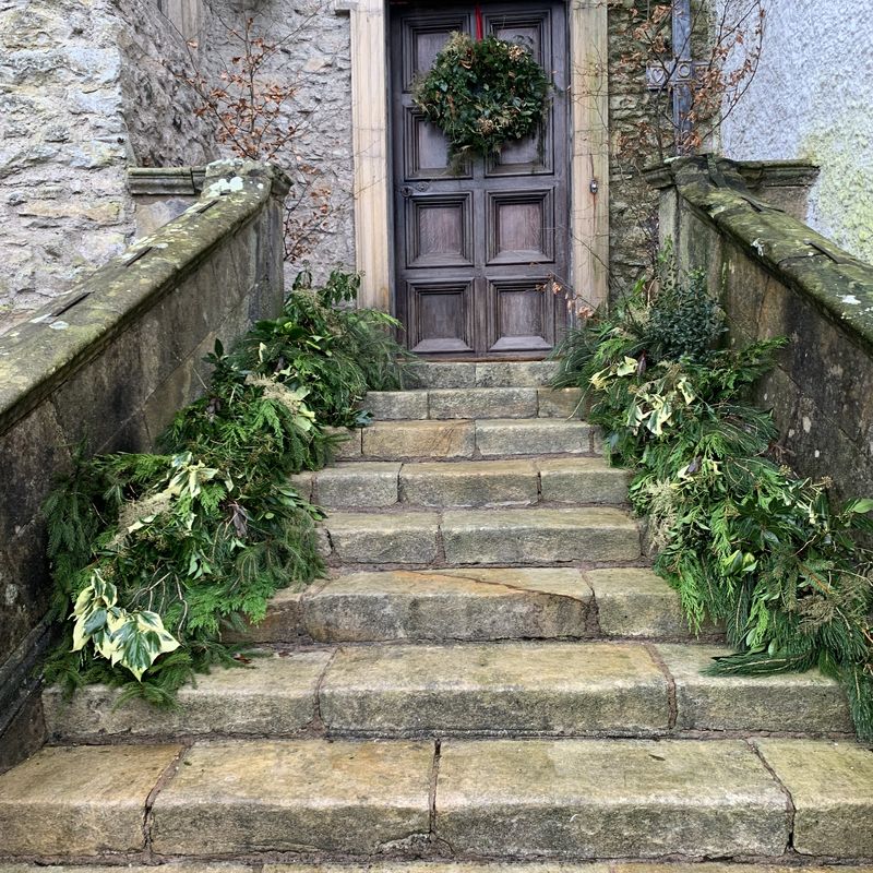 Steps leading to the entrance of Levens Hall and Gardens, near Kendal in Cumbria