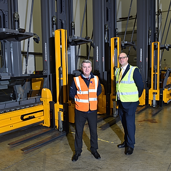 (l-r) Ged Carabini and Kevin Barber with some of the EKX 516 VNA fleet.jpg