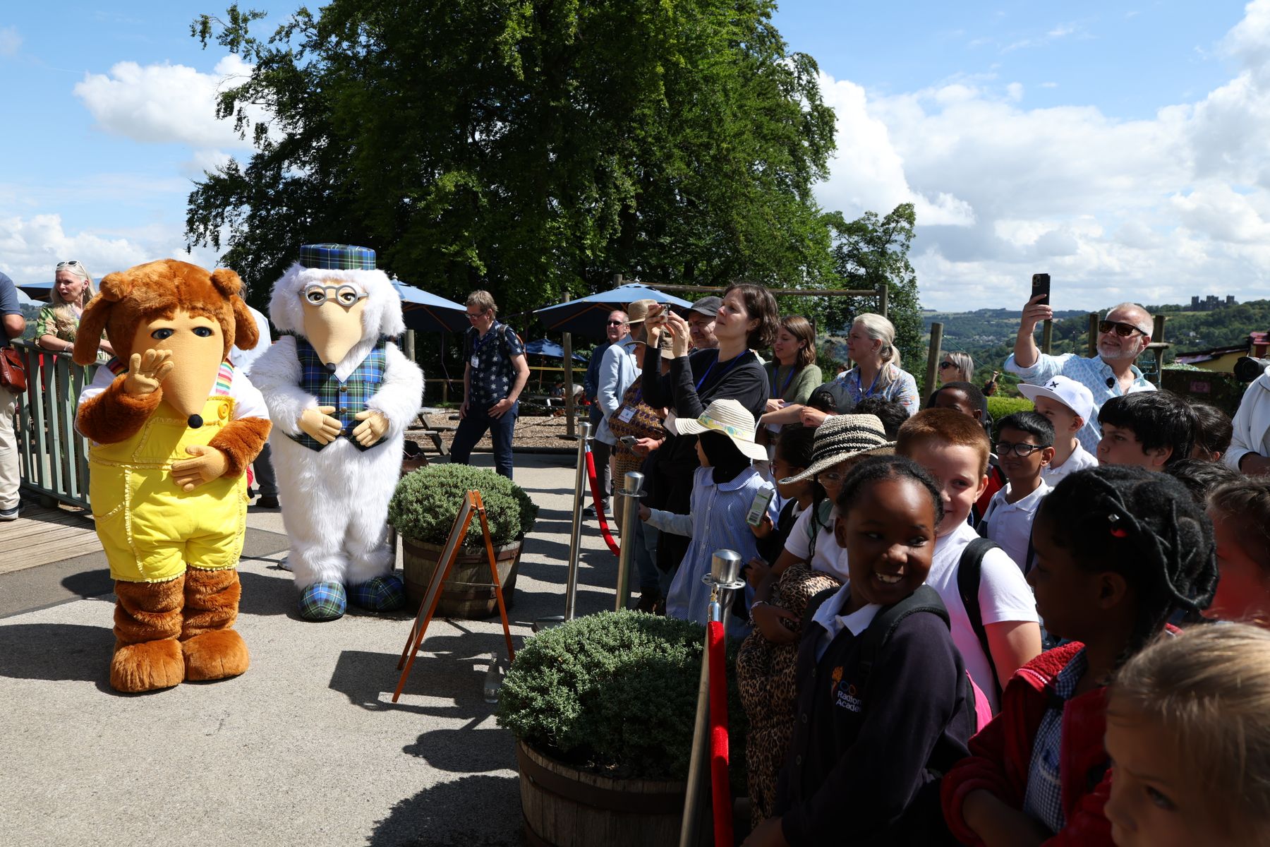 Press and visitors gather for the opening event.JPG