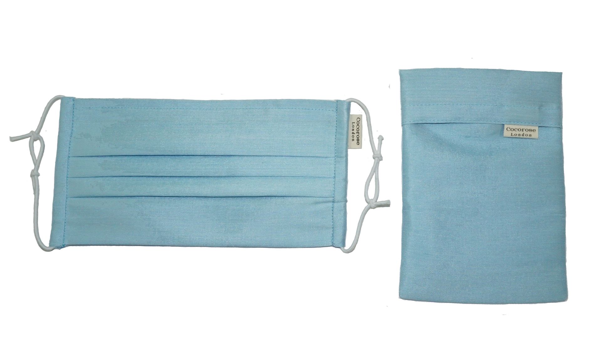 Sky Blue pleated silk face mask and matching silk pouch from Cocorose London.