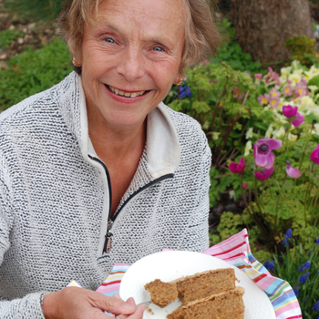Lifestyle image of woman eating vegan cake