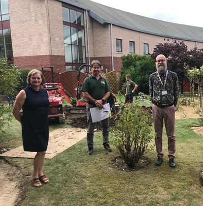 Hospice CEO, the landscaper and David Hamilton.jpg