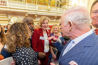  CEO Tina Seymour (centre) meeting HM The King